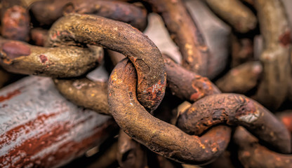 iron chain weighs on the pipe as a background for designers and artists