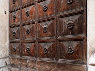 Ferrara, Italy. San Carlo church door, detail.