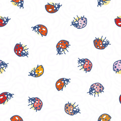 White pattern with swirl and ladybug.