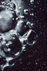 Fototapeta na wymiar Bubbles in the water close-up