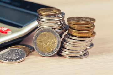stack of coins and calculator,concept idea for business finance