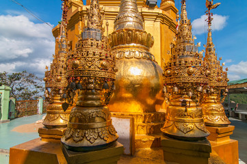 Decorative ornament Popa Taungkalat monastery atop an outcrop of Mount Popa volcano, Myanmar.
