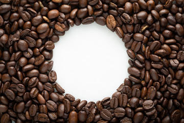 Coffee beans in arch on a white background text space in centre