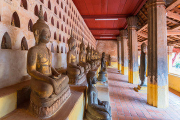 Rows of Buddha images at Wat Si Saket, Vientiane, Laos. - Powered by Adobe