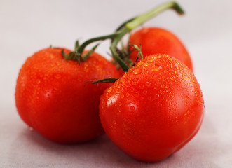 three ripe tomatoes
