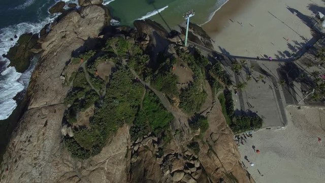 Aerial view on the sea waves and rocks. Beautiful nature background. Arpoador hill. Rio de Janeiro city Brazil. 