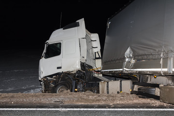 Car accident on a road in winter, car after a collision with a car