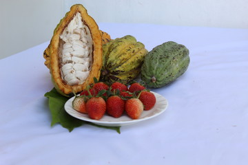  cocoa and strawberry fresh vegetables isolated on white 