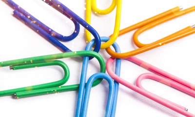 Colorful paper clips on a white background