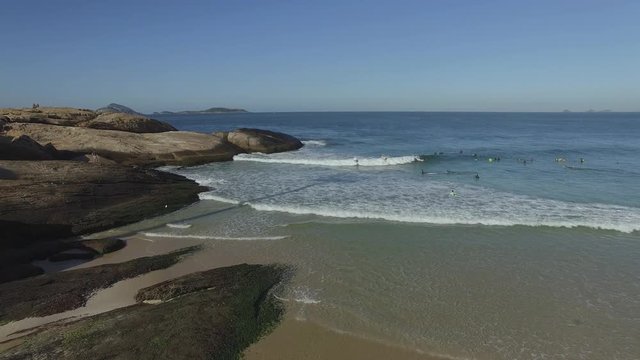 Scenic panoramic view of Ipanema Beach from the rocks at Arpoador with Rio de Janeiro skyline Brazil. 