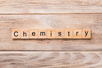 Chemistry word written on wood block. Chemistry text on wooden table for your desing, concept