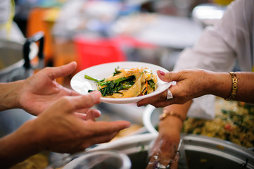 Share food for homeless hungry people to alleviate hunger food : the concept of donating aid