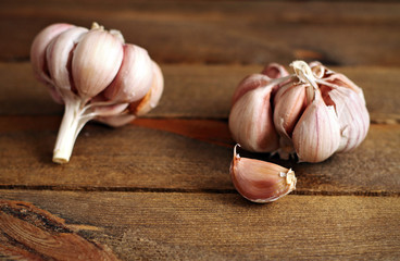 A pair of garlic on wood