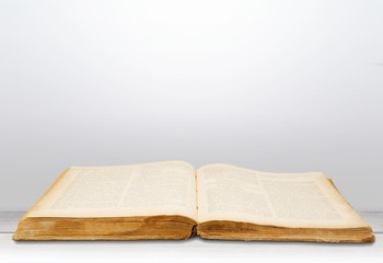 Open Holy bible book on background