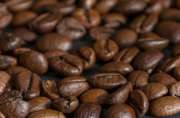 Baked brown coffee beans background