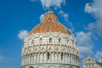 Fototapeta premium Pisa Baptistery historic tower with lots of decoration at it's walls. Toscana, Italy