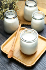smoothie or milk shake or yogurt in glass bottle