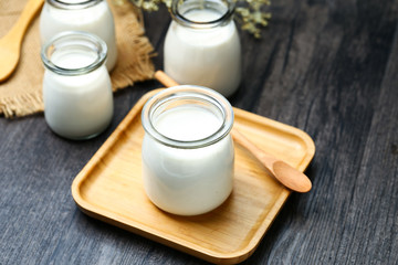 Obraz na płótnie Canvas smoothie or milk shake or yogurt in glass bottle