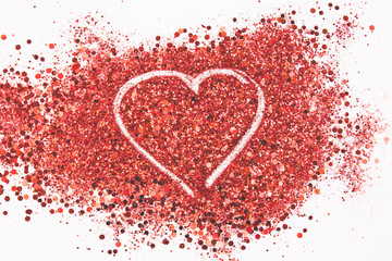 Beautiful drawing a heart on a glitters background. Love concept.