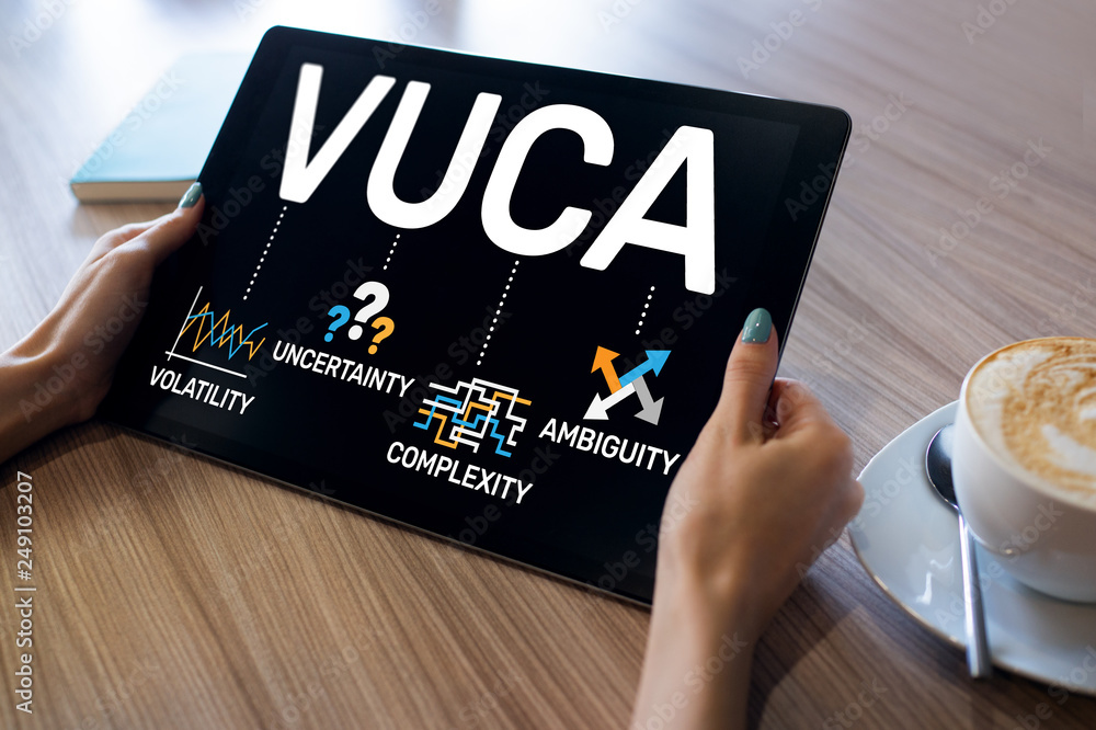 Poster vuca world concept on screen. volatility, uncertainty, complexity, ambiguity.