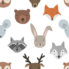 Cute cartoon seamless pattern with forest animals heads on white background. Funny hand drawn texture with fox, wolf, raccoon, deer for kids design, wallpaper, textile, wrapping paper