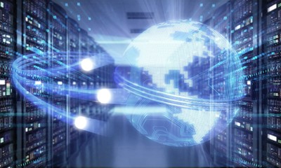 Corridor in Working Data Center Full of Rack Servers and Supercomputers.