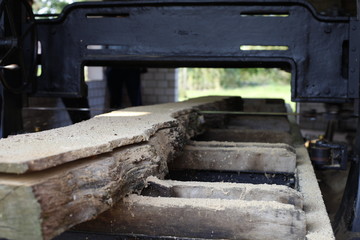 detail of a vintag wood sawing machine