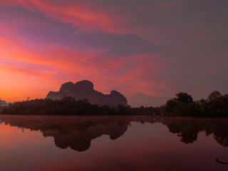 Fishing man at lakeside 