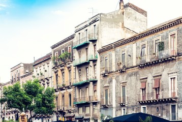 Beautiful cityscape of Italy, historical street of Catania, Sicily, facade of old buildings.