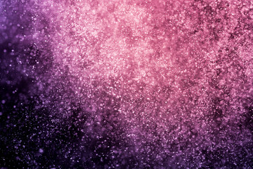 Abstract purple bokeh defocus glitter background.