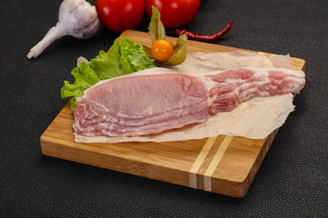 Raw pork bacon