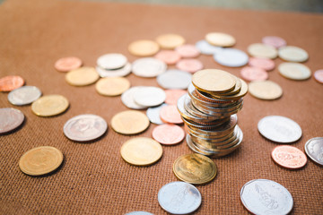 Closeup pile of coins using as business investment and financial concept