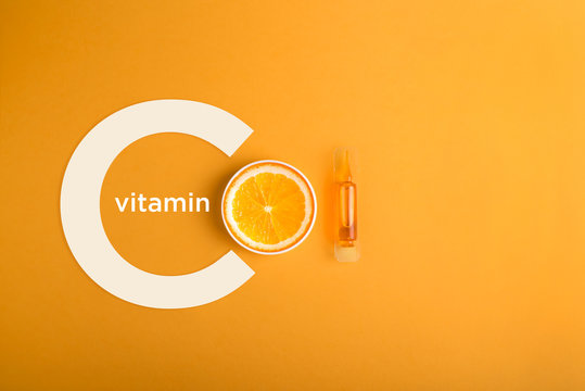 Serum and cosmetics with vitamin C.  Immunity protection concept, antiviral prevention Essential oil from citrus fruits. 