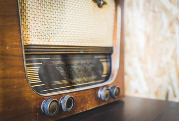 Close up on old vintage radio on hardwood