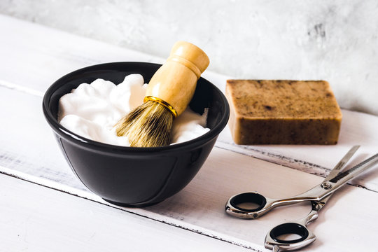 Wooden desktop with tools for shaving beards