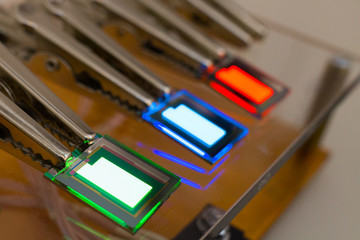 Naklejka premium Checking turn on small RGB oled display on a probe station