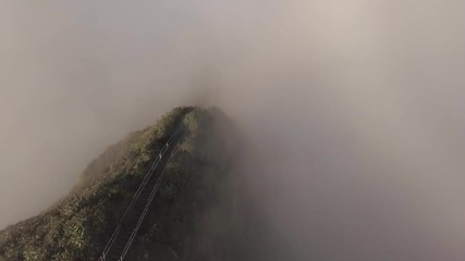 Oahu's Haiku Stairs descend into cloud