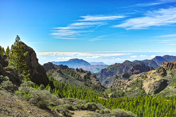 Fototapeta na wymiar Gran Canaria island mountains landscape, view from peak Roque Nublo to Mount Teide on Tenerife