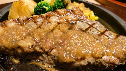Steak cooked in Japanese style with orange sauce