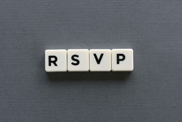 RSVP word made of square letter word on grey background.