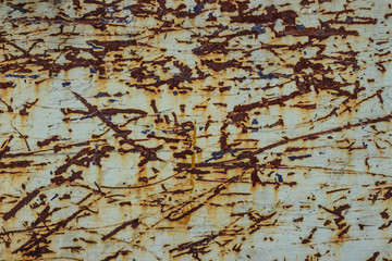 Scratched and rusty steel wall for background. Grungy metal plate with scratched texture for abstract background.