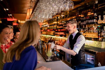 Fototapeta na wymiar Bartender Making a Cocktail