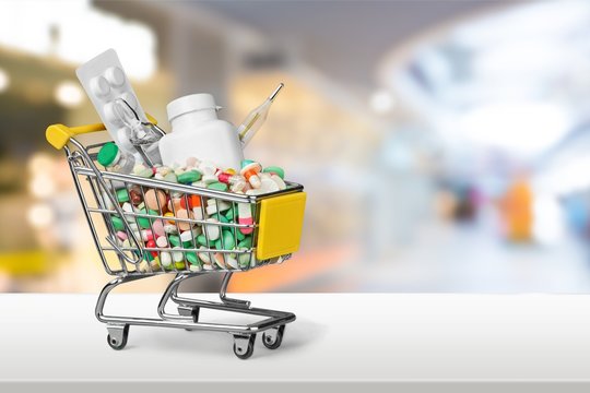 Shopping Cart with pills close-up view