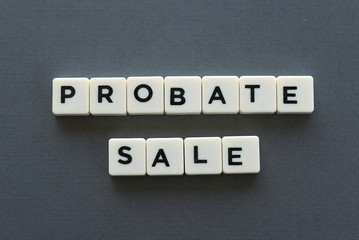 Probate sale word made of square letter word on grey background.
