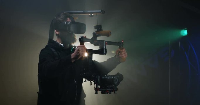 Young cameraman shooting a scene
