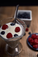 Glass cup with yogurt and fruits