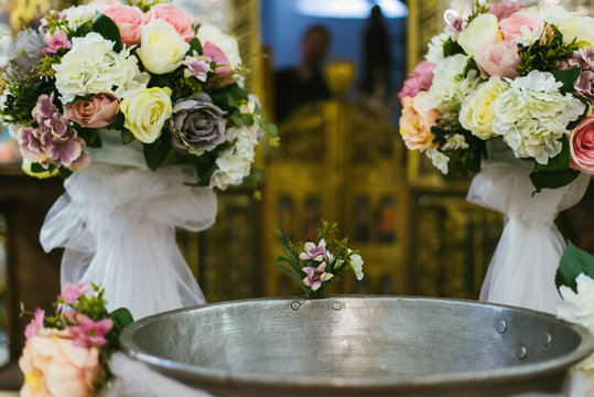 flower setting for baptism in a church