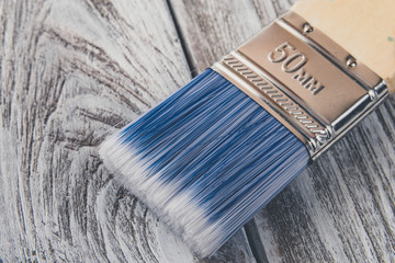 paint brush on wooden background