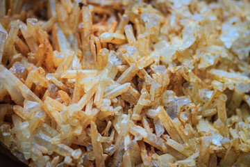 Raw specimen of quartz crystal stone from mining and quarrying industries. Quartz is a mineral composed of silicon and oxygen atoms that commonly used in the making of jewelry and hard stone carvings.