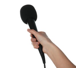 Woman holding microphone on white background, closeup
